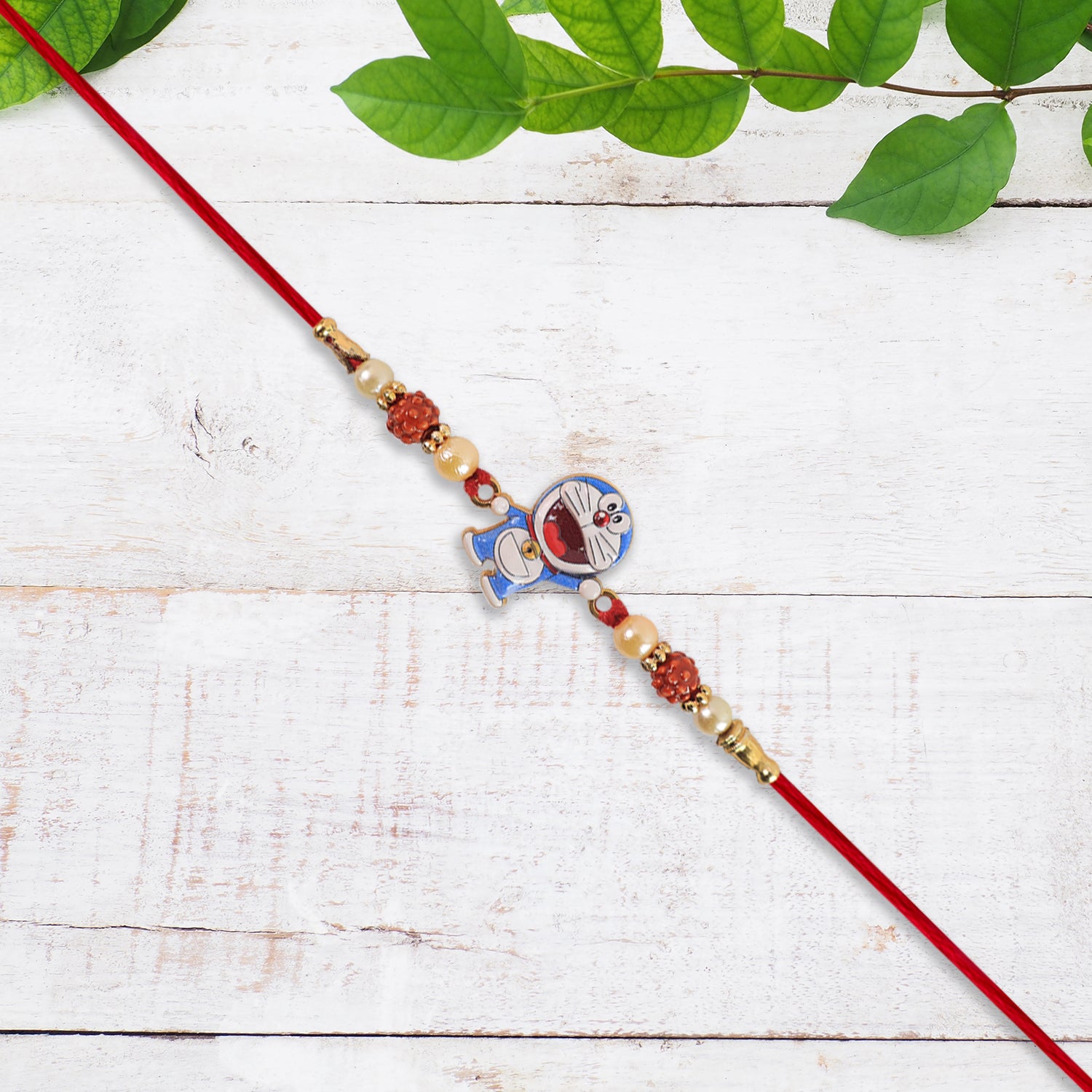 Cute Doraemon Kids Rakhi With Rudraksha  Pearl Beads Cute Doraemon Kids Rakhi With Rudraksha  Pearl Beads